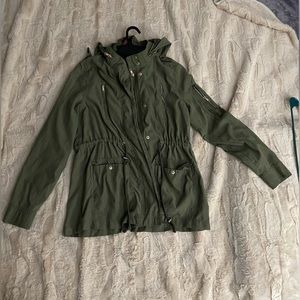 Rain coat/ sweater. Size small. Color green